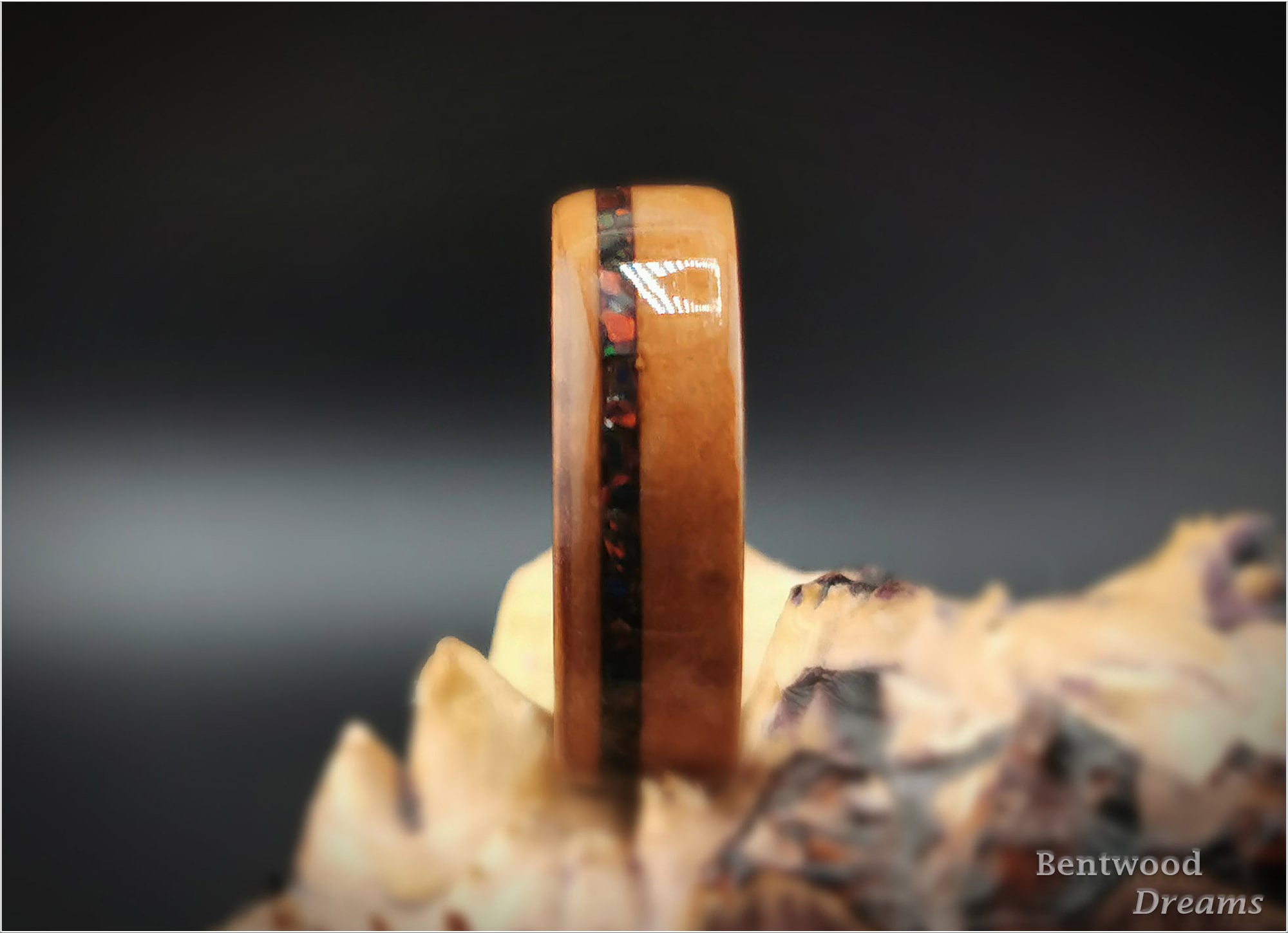 Bentwood Ring: Madrone Burl, offset inlaid Lab Opal, polished Tungsten Carbide core