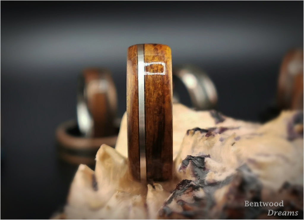 Bentwood Ring: Ako, inlaid offset Sterling Silver wire, Polished Black Ceramic core, wood ring