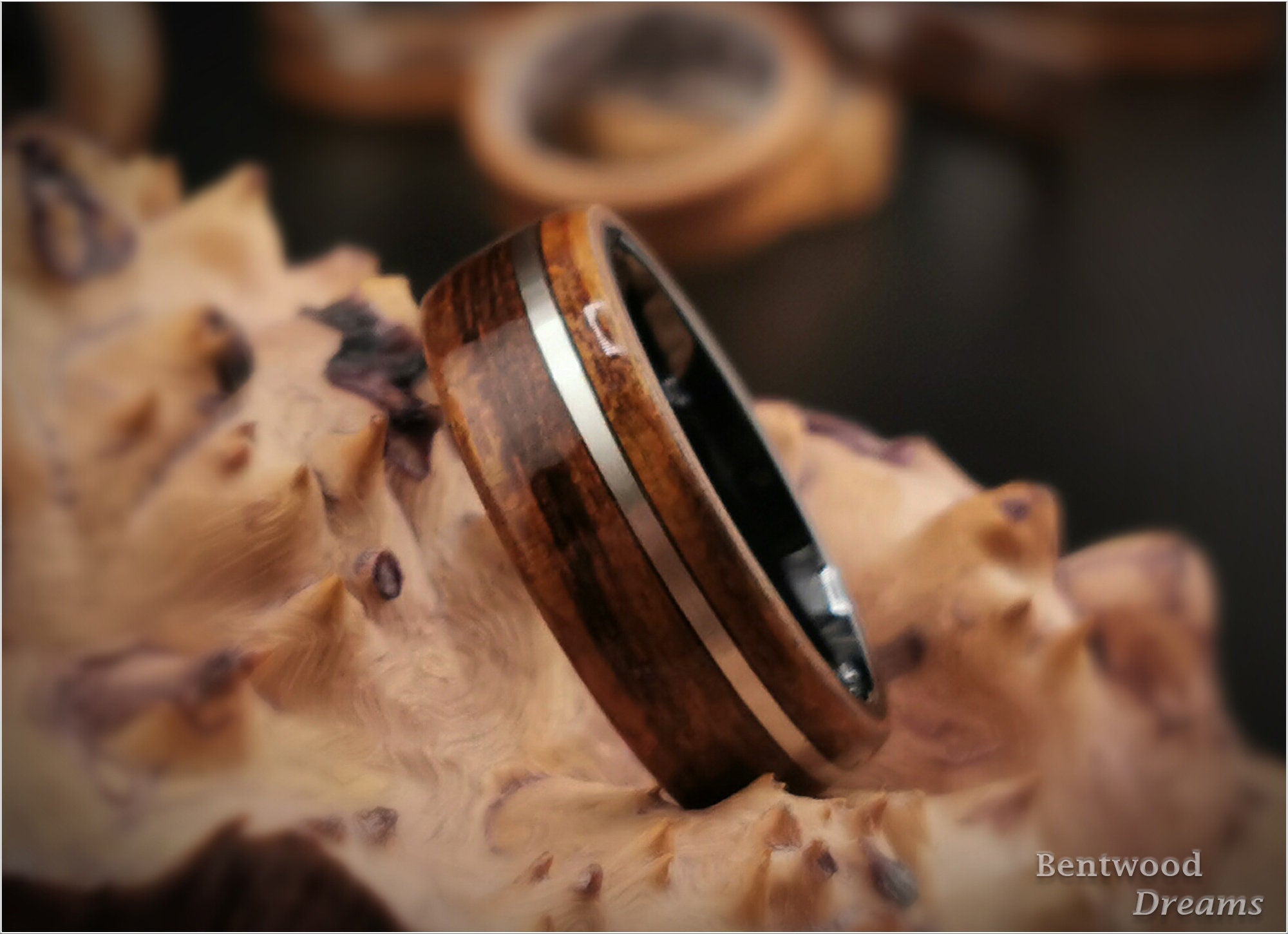 Bentwood Ring: Ako, inlaid offset Sterling Silver wire, Polished Black Ceramic core, wood ring