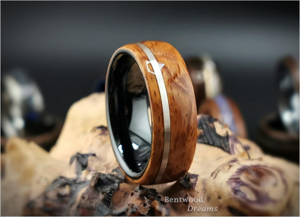 Bentwood Ring: Quilted Afzelia, offset inlaid Sterling Silver, Polished Black Ceramic core, wood ring