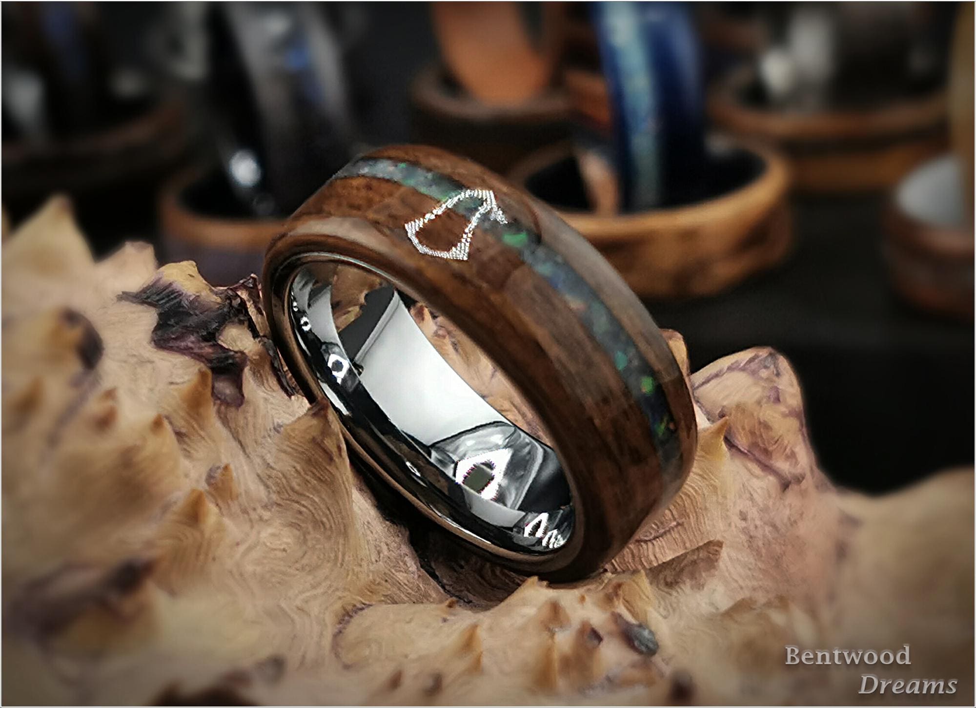 Bentwood Ring: Quartersawn Mozambique, offset inlaid Ethiopian Opal, Tungsten Carbide core, wood ring