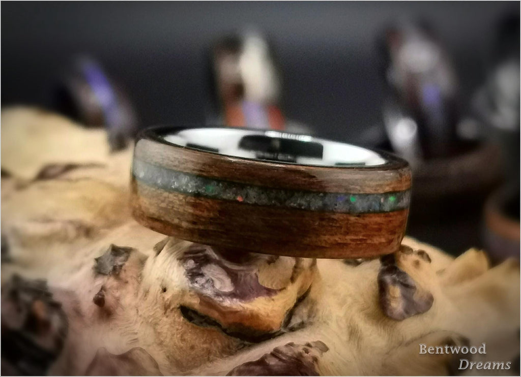 Bentwood Ring: Quartersawn Mozambique, offset inlaid Ethiopian Opal, Tungsten Carbide core, wood ring
