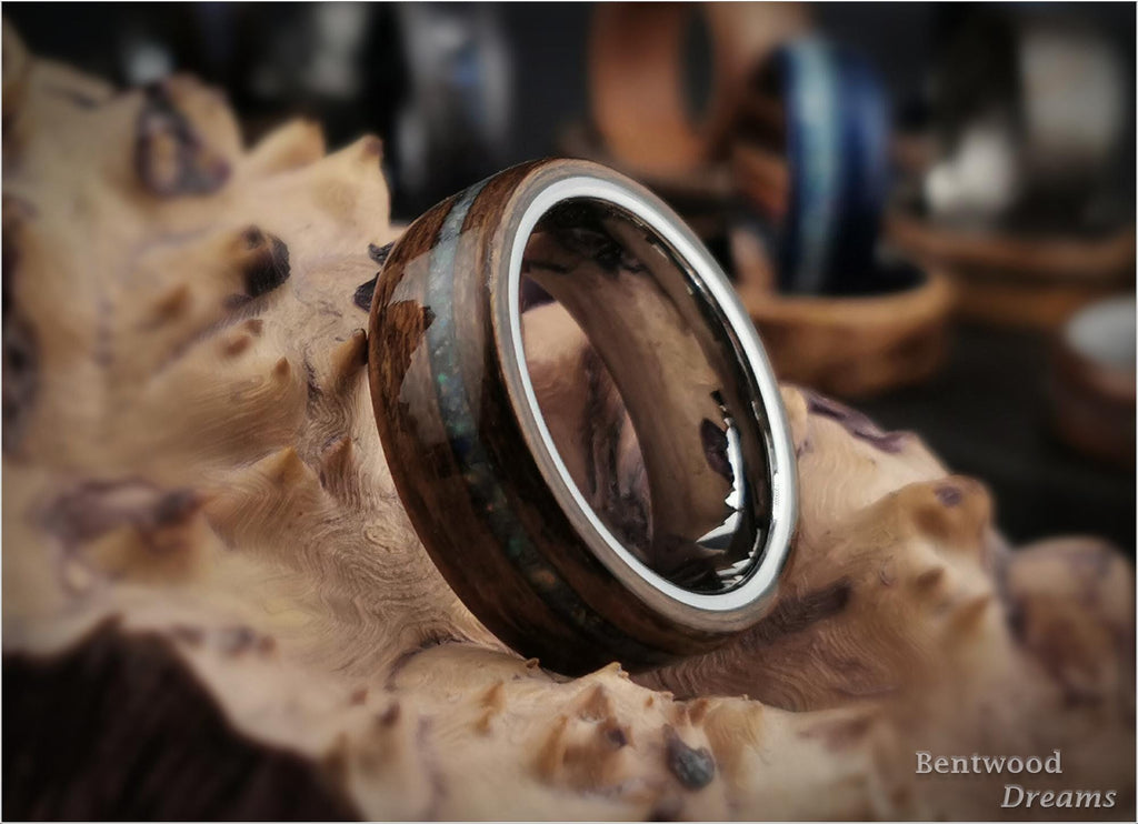 Bentwood Ring: Quartersawn Mozambique, offset inlaid Ethiopian Opal, Tungsten Carbide core, wood ring