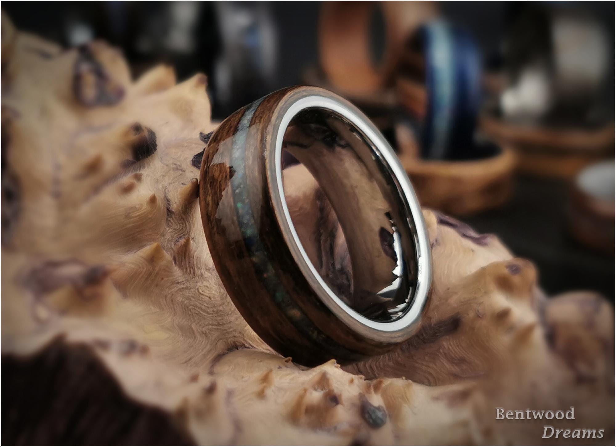 Bentwood Ring: Quartersawn Mozambique, offset inlaid Ethiopian Opal, Tungsten Carbide core, wood ring
