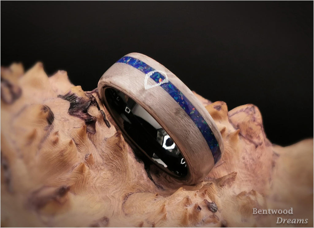 Bentwood Ring: Silver Birdseye Maple, offset inlaid Opal, Polished Black Ceramic core, wood ring