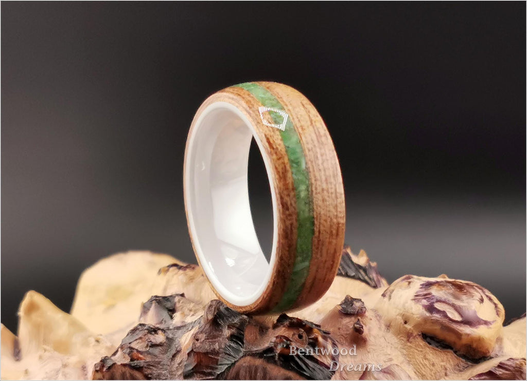 Bentwood Ring: Okoume, offset inlaid Nevada Apple Variscite, polished White Ceramic core, wood ring