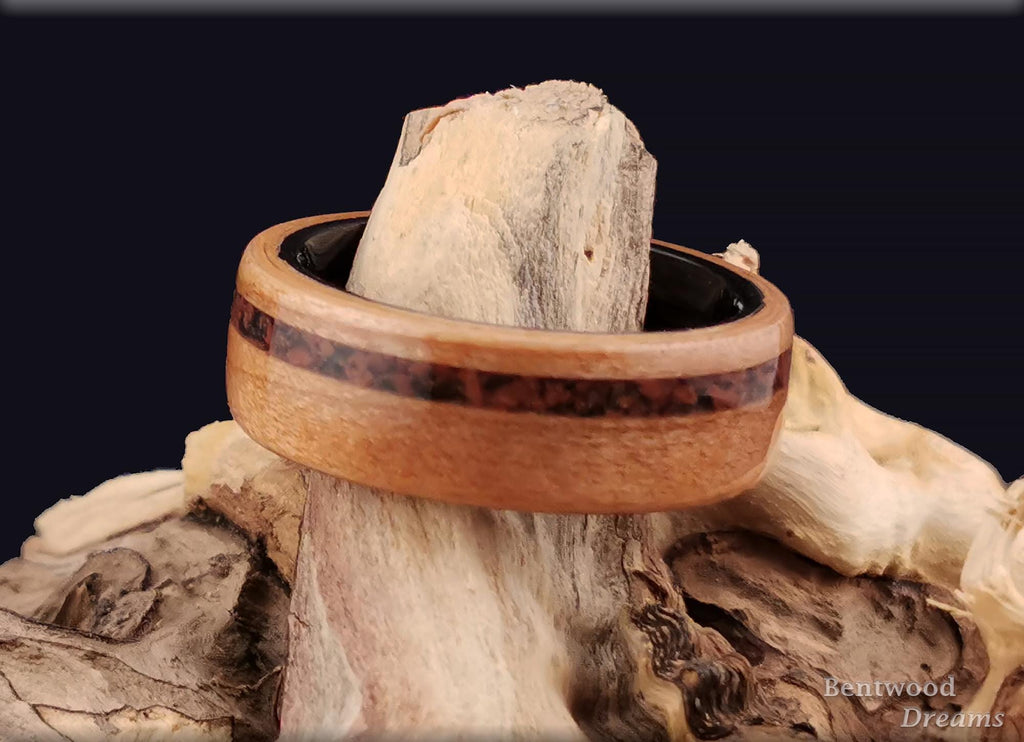 Bentwood Ring: Figured Cherry, offset inlaid Mahogany Obsidian, Polished Black Ceramic core, wood ring