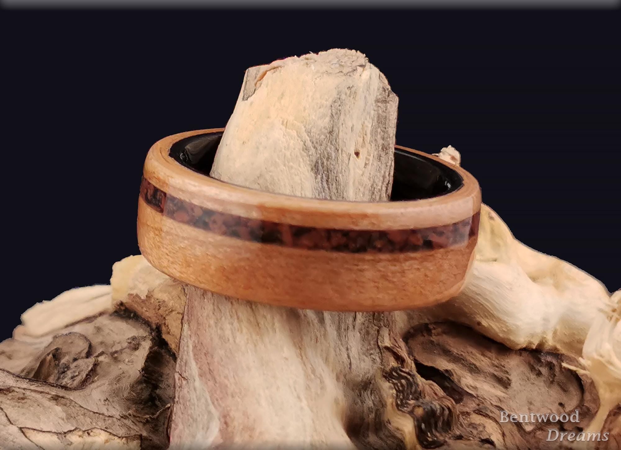 Bentwood Ring: Figured Cherry, offset inlaid Mahogany Obsidian, Polished Black Ceramic core, wood ring