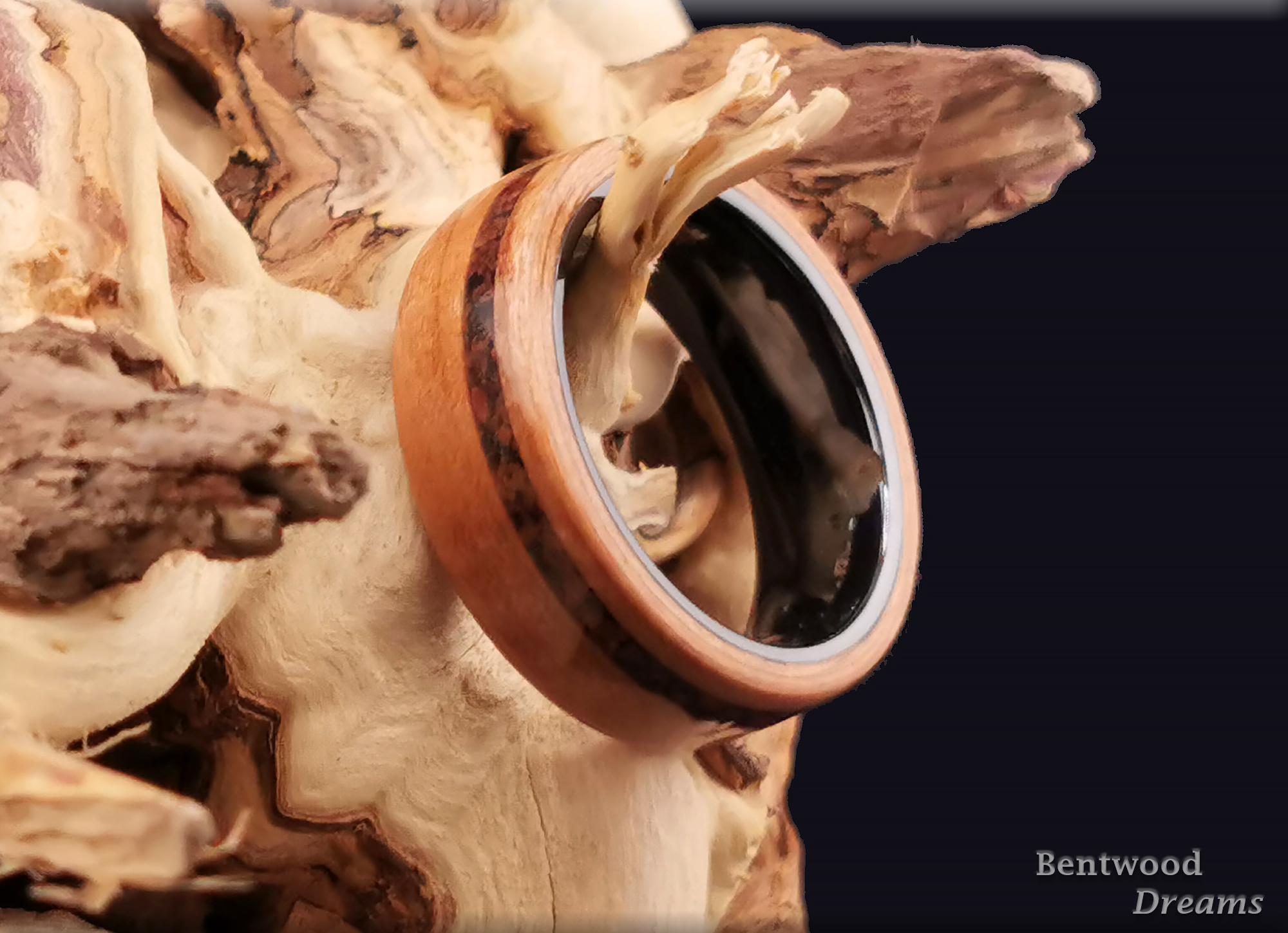 Bentwood Ring: Figured Cherry, offset inlaid Mahogany Obsidian, Polished Black Ceramic core, wood ring