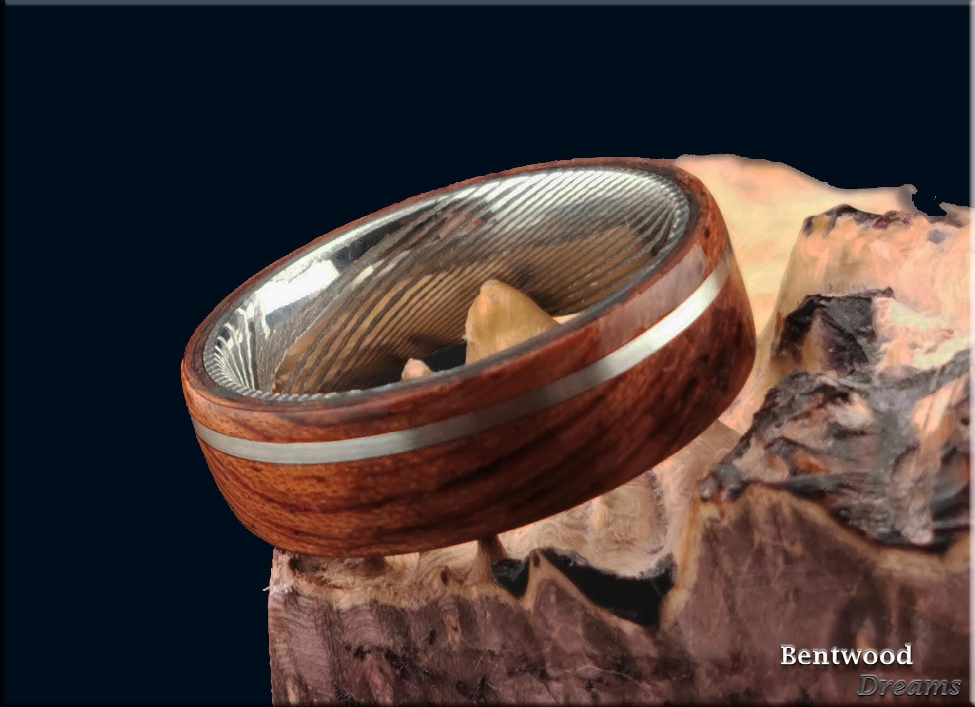 Bentwood Ring: Waterfall Bubinga, offset inlaid Sterling Silver wire, Damascus Steel core, wood ring