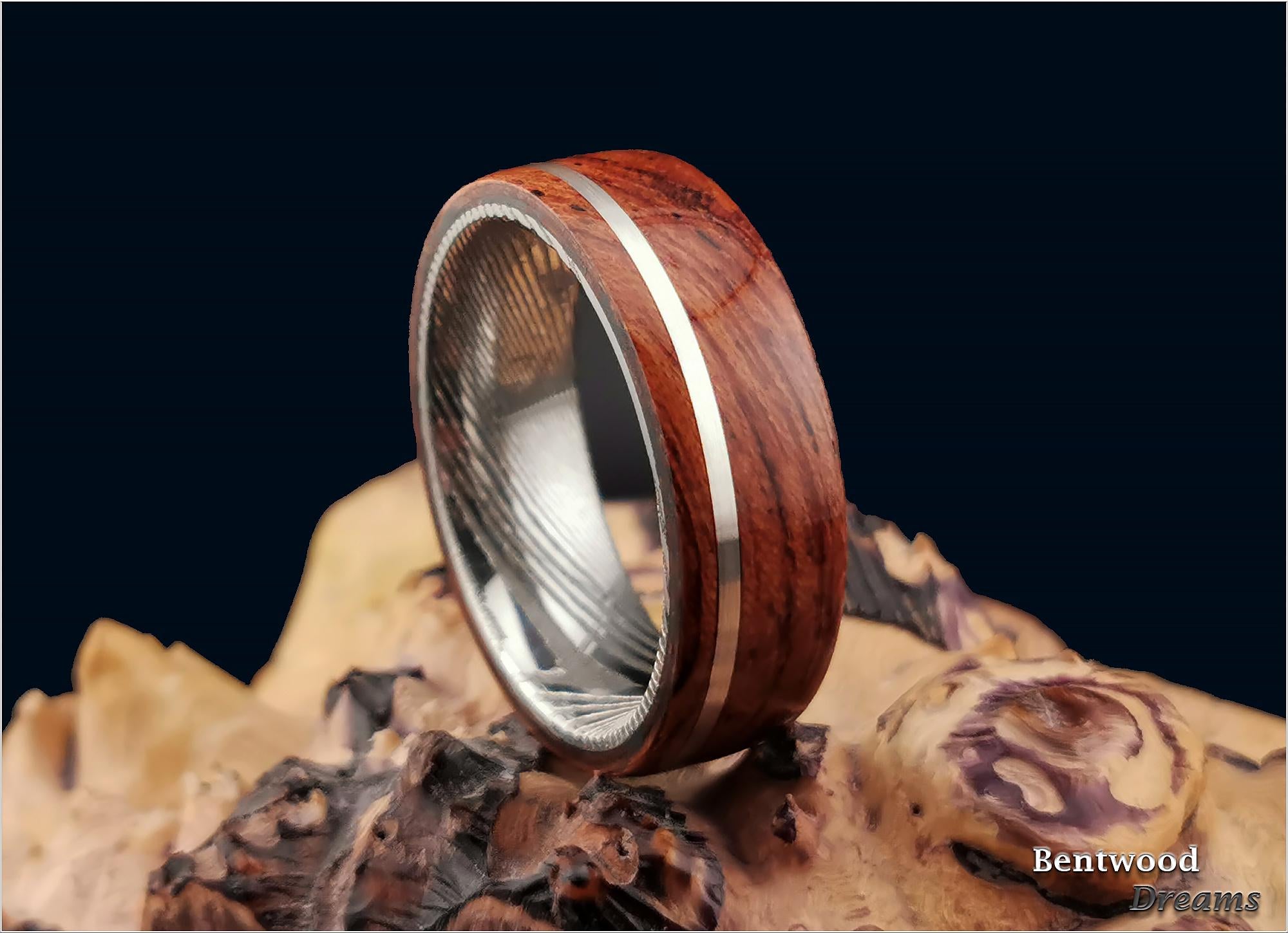 Bentwood Ring: Waterfall Bubinga, offset inlaid Sterling Silver wire, Damascus Steel core, wood ring