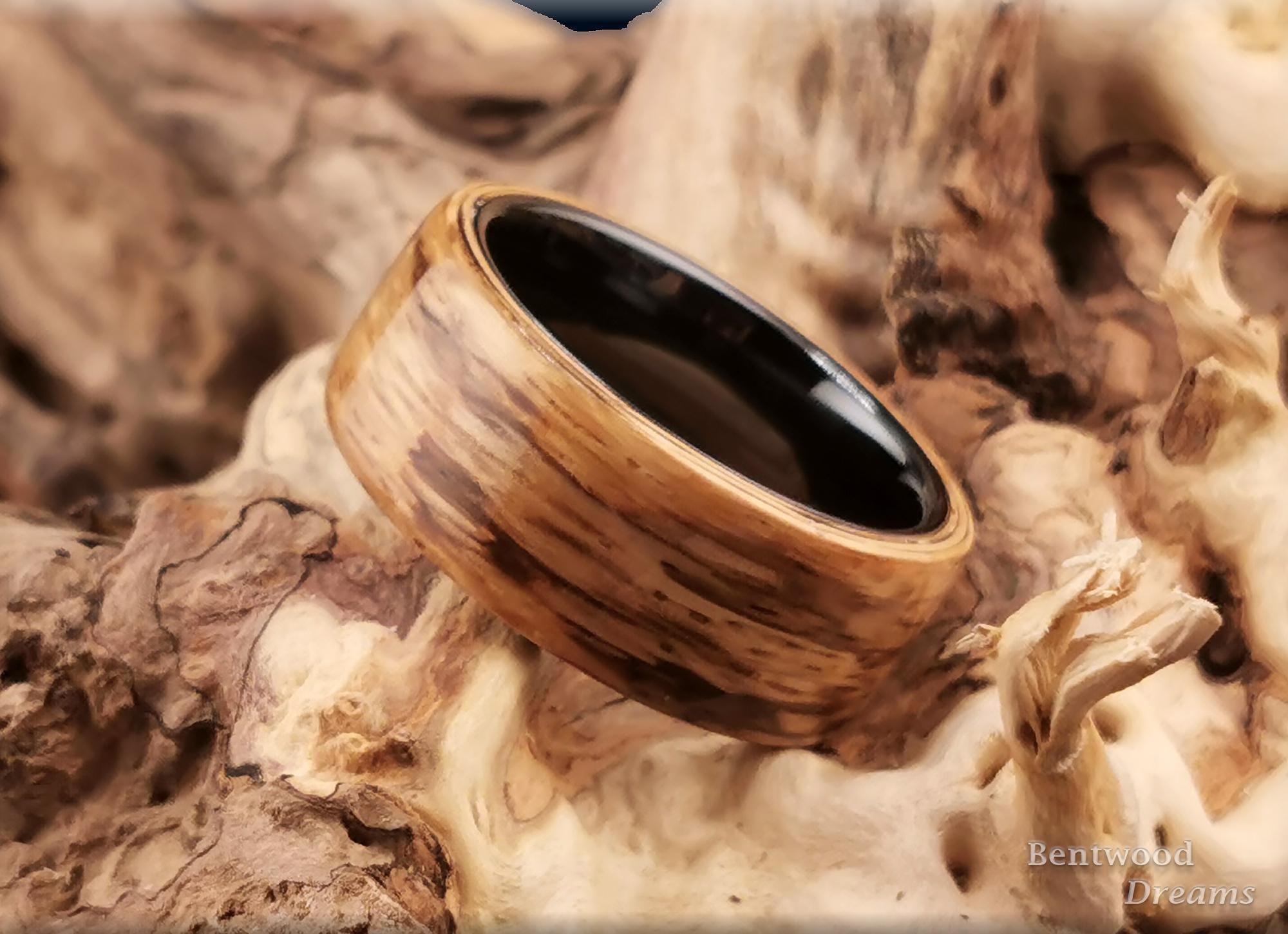 Bentwood Ring: Marbled Zebrano, 10mm Black Ceramic core, wood ring