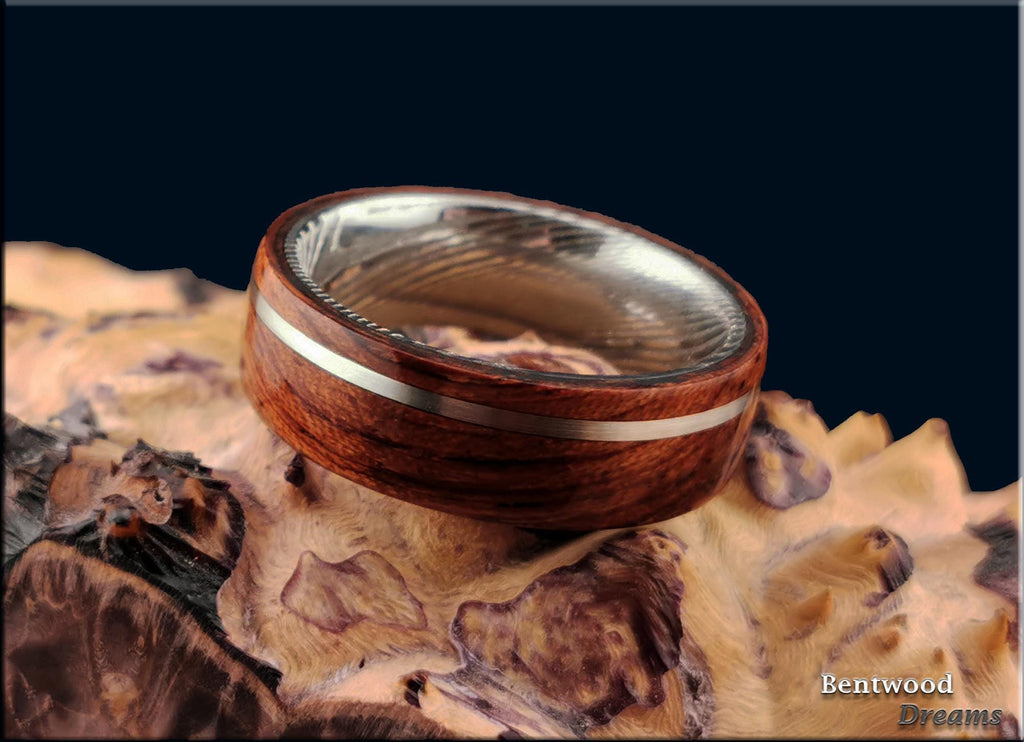 Bentwood Ring: Waterfall Bubinga, offset inlaid Sterling Silver wire, Damascus Steel core, wood ring