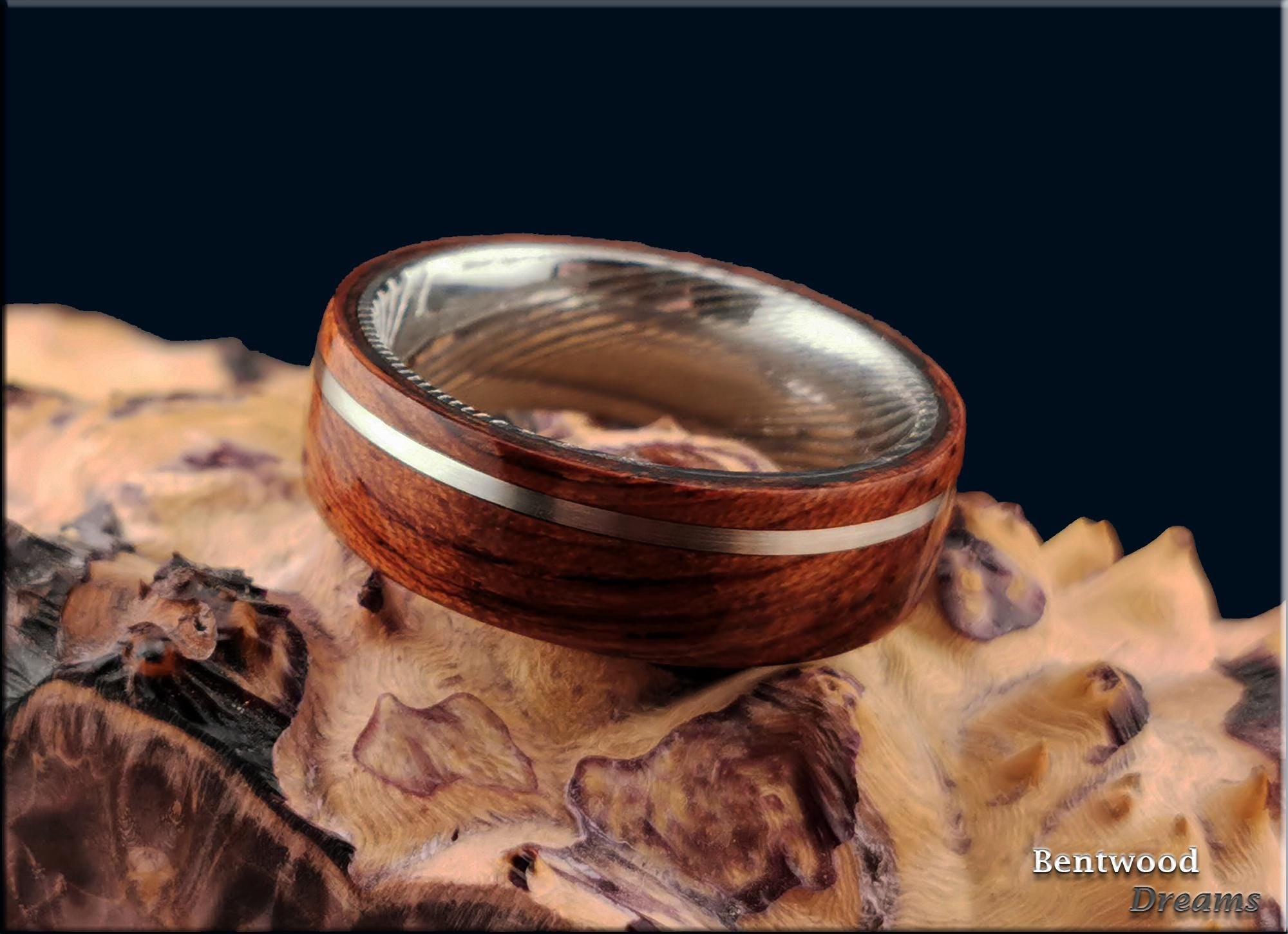 Bentwood Ring: Waterfall Bubinga, offset inlaid Sterling Silver wire, Damascus Steel core, wood ring