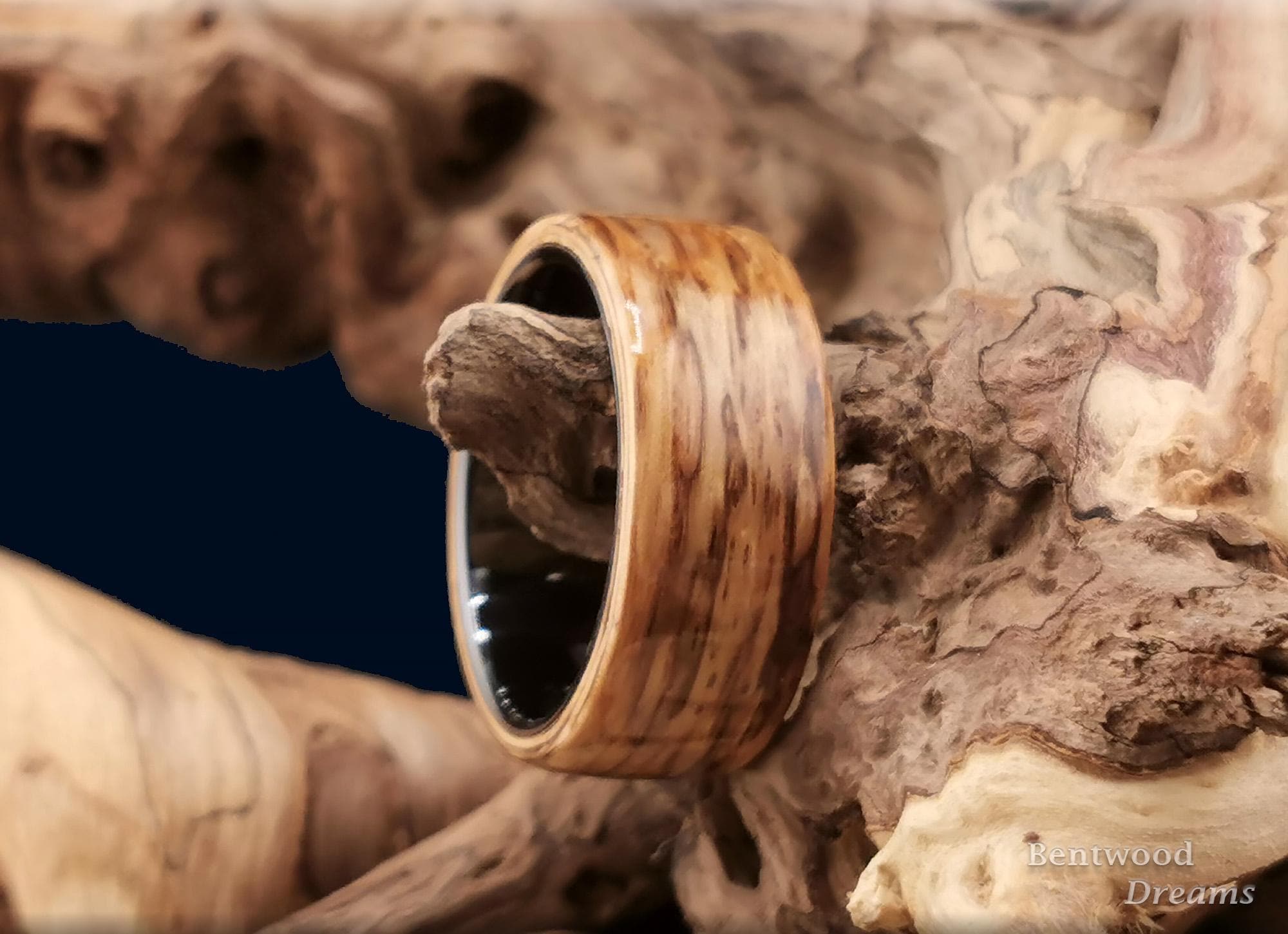 Bentwood Ring: Marbled Zebrano, 10mm Black Ceramic core, wood ring