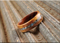 Bentwood Ring: Tiger Etimoe, inlaid K2 Granite, Ironwood Core, wood ring