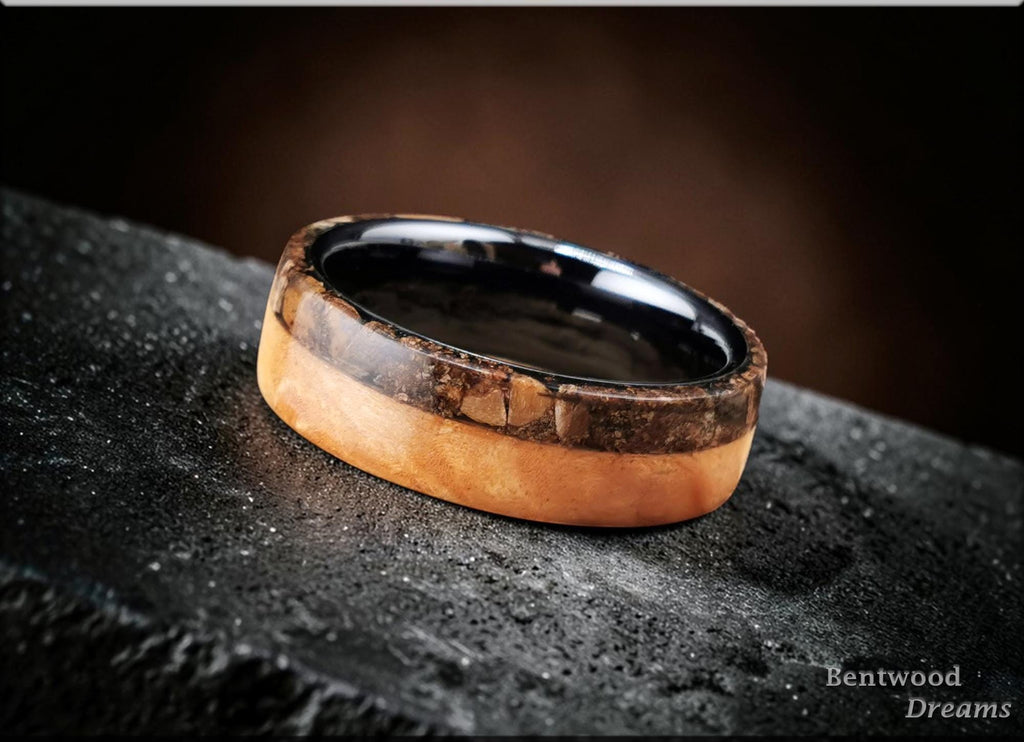 Bentwood Ring: Figured Maple, live edge inlaid Velociraptor Bone, polished Black Ceramic core